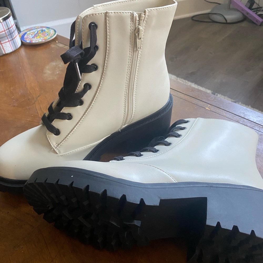 White and black combat boots